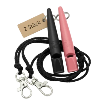 Zwei ACME-Trainingspfeifen (schwarz und rosa) an schwarzen Lanyards mit Metallclips und Etikett „2 Stück“.