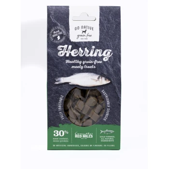 Packaging for "Go Native Grain Free Herring" dog treats, featuring a fish image, claims of 30% meat content, and "sustainably sourced."
