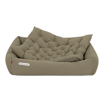 Ein gemütliches, taupefarbenes Haustierbett mit einem gepolsterten Design und einem abnehmbaren Kissen, mit dem Logo "Doctor Bark" an der Seite.