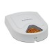 Distributeur automatique de nourriture pour animaux de compagnie par PetSafe, avec un design gris et un compartiment triangulaire rempli de nourriture colorée pour animaux.