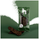 Hundeleckerlis in einer grünen Verpackung mit dem Aufdruck "hanfred" und dem Gesicht eines Hundes, mit "Fleischsnack für Hunde" und "wild" auf der Vorderseite.