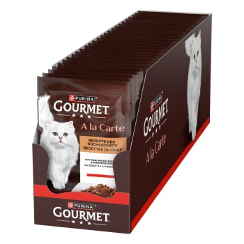 Aufstellbox mit Purina Gourmet „A la Carte“ Katzenfutter‑Beuteln, Bild einer weißen Katze und sichtbarer Text ‚Gourmet A la Carte‘