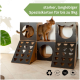 Eine Katze erkundet eine mehrstöckige Pappspielstruktur mit ausgeschnittenen Formen, beschriftet "starker, langlebiger Spezialkarton für bis zu 9kg."