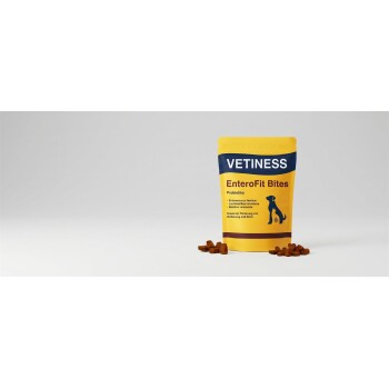 Gelbe VETINESS EnteroFit Bites-Tasche (Probiotika) mit Hundesilhouette und verstreuten braunen Bites.