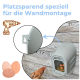 Wandmontierte Hennen-Nistbox mit Eiern und Heu an einer Holzwand; Montage-Detail; Text: 'Platzsparend speziell für die Wandmontage'.