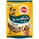 Verpackung von Pedigree Tasty Minis Hundeleckerlis mit runden, zweifarbigen Snacks. Der Text enthält "Leckerbissen", "Rind und Käse Geschmack" und "<5% Fett."