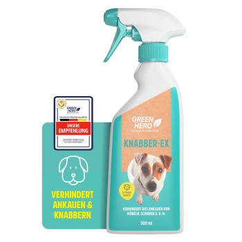 Eine weiße Sprühflasche mit der Aufschrift "GREEN HERO" und dem Slogan "Die Natur weiß es am besten" sowie "Knabber-EX", mit einem Nahaufnahmebild eines kleinen Hundes.
