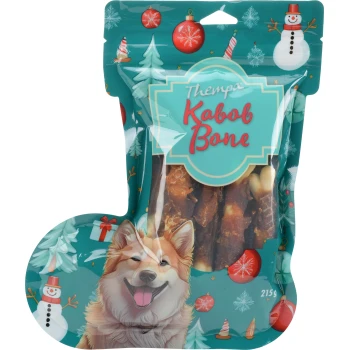 Thempa Kabob Bone Hundeleckerlis in festlicher Verpackung mit glücklicher Hundillustration und Weihnachtsdekoration, 215g.