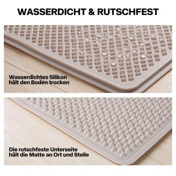 Nahaufnahme einer beigefarbenen Silikon-Haustiermatte mit Wassertropfen; sichtbarer Text (übersetzt): 'Wasserdicht & rutschfest'.