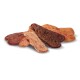 Assorted pet treats in various shapes and colors, including brown, orange, and beige, arranged on a white background.