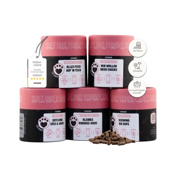 Sechs bunte ALPHAZOO Tierfutterdosen, die Fisch-, Enten- und Hühnchen-Geschmäcker zeigen und betonen, dass sie getreidefrei und mit hohem Fleischanteil sind.