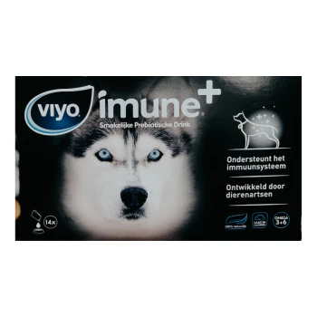 Viyo Immune+ prebiotic drink for dogs, featuring a close-up of a husky with blue eyes, text in Dutch about immune support and vet-developed formula.