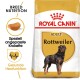 Royal Canin Rottweiler Adult Hundefutterbeutel, mit einem Rottweiler-Bild, und Text, der die Rassenernährung und Herzgesundheit hervorhebt.