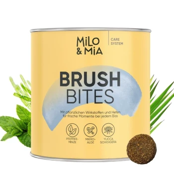 Dose Milo & Mia Daily Bites Dental Care für Hunde, mit einem Cartoon-Hund, Minzblättern und Text, der die Vorteile frischen Atems hervorhebt.