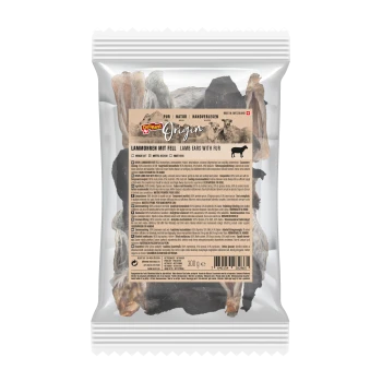 Sac en plastique transparent d'oreilles d'agneau avec fourrure, étiqueté "DeliBest Origin" en plusieurs langues, montrant les informations nutritionnelles et les ingrédients.