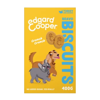 Die Verpackung der Edgard Cooper Bravo Biscuits zeigt einen braunen und grauen Cartoon-Hund mit "Crunch Crunch" und "Kein Zuckerzusatz, wirklich."
