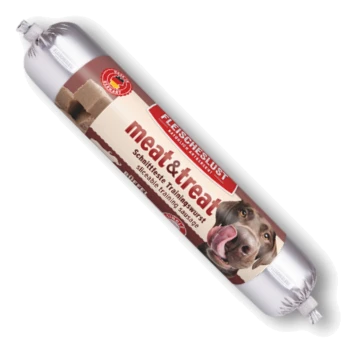 Silberverpackte zylindrische Hundetrainingswurst mit Aufschrift 'meat&treat' und 'FLEISCHESLUST' sowie einem leckenden Hundegesicht.