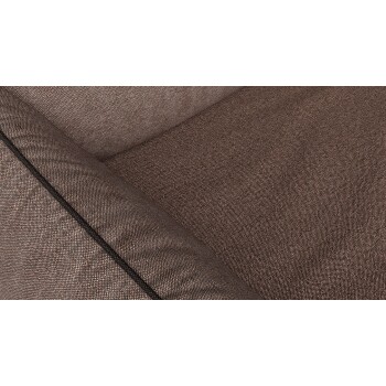 Nahaufnahme eines strukturierten braunen Haustierbett-Stoffes, der seine weiche, gewebte Oberfläche und den kontrastierenden schwarzen Nähten zeigt.