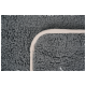 Couverture pour animaux grise avec une texture douce et duveteuse et une bordure blanche, partiellement pliée pour montrer sa surface moelleuse.
