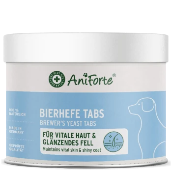 Behälter mit AniForte-Bierhefe-Tabletten für Hunde, beschriftet "100% natürlich," "Hergestellt in Deutschland," und "Erhält die vitale Haut & glänzendes Fell."