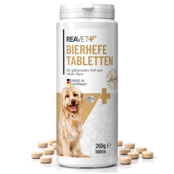 Behälter mit REAVET Bierhefe-Tabletten für Hunde, die glänzendes Fell und gesunde Haut fördern. Hergestellt in Deutschland, 500 Tabletten, 260g.
