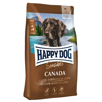 Hundefutterbeutel mit der Aufschrift 'Happy Dog Sensible Canada', mit einem braunen Hintergrund, einem großen Hundebild und Zutaten: Lachs, Kaninchen und Lamm.