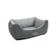 Graues Haustierbett mit einem weichen, gesteppten Innenraum und einem stilvollen Design, mit dem Text "TrendPet" auf der Seite gestickt.