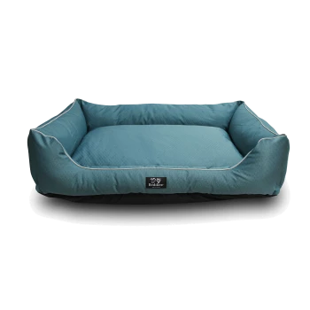 Teal pet bed with a hexagonal pattern and raised edges, featuring a black base and a "Beddies" logo tag.
