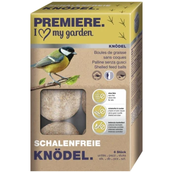 Box labeled "PREMIERE. I ♥ my garden" containing shelled feed balls for birds, picture of a tit, text "SCHALENFREIE KNÖDEL."