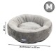 Graues Haustierbett mit weichem Innenfutter, 20 cm hoch und etwa 65 cm im Durchmesser, mit der Größe "M" gekennzeichnet.