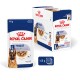 Royal Canin Maxi Adult dog food, 140g pouch, 10-pack, featuring gravy for digestive health, with a German Shepherd on the packaging.