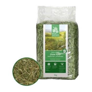 Un sac de 1 kg de foin premium étiqueté "Real Nature," présentant de l'herbe verte et un insert circulaire montrant la texture du foin.