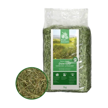 A 1kg bag of premium hay labeled "Real Nature," featuring green grass and a circular inset showing the hay texture.