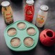 Grünes SmoothieDog-Sechsfach-Tablett mit gefrorenen Hundeleckerlis, drei SmoothieDog-Fläschchen (eines mit Aufschrift 'Immunio') und rotem Leckerliball.