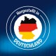Logo von Deutschlands Umriss in Schwarz, Rot und Gelb mit 'Hergestellt in DEUTSCHLAND' auf einem blauen Hintergrund.