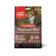 Orijen Regional Red Katzenfutterverpackung mit einer Katze im Wald, die "85% hochwertige tierische Zutaten" und "biologisch angemessene Ernährung" zeigt.