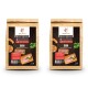 Zwei Taschen WILDFANG Hundefutter, beschriftet mit "HUHN mit Süßkartoffel & Kräuter," jeweils 2 kg schwer, mit Bildern von Huhn und Gemüse.