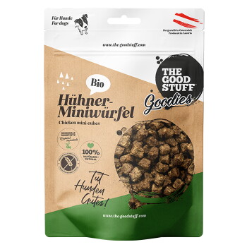 Tüte 'The Good Stuff Goodies' Bio Hühner-Miniwürfel (Hühner-Miniwürfel), Hundeleckerlis mit rundem Sichtfenster, das die braunen Würfel zeigt.