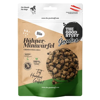 Tüte 'The Good Stuff Goodies' Bio Hühner-Miniwürfel (Hühner-Miniwürfel), Hundeleckerlis mit rundem Sichtfenster, das die braunen Würfel zeigt.