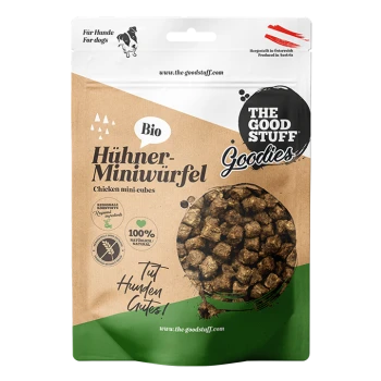 Tüte 'The Good Stuff Goodies' Bio Hühner-Miniwürfel (Hühner-Miniwürfel), Hundeleckerlis mit rundem Sichtfenster, das die braunen Würfel zeigt.