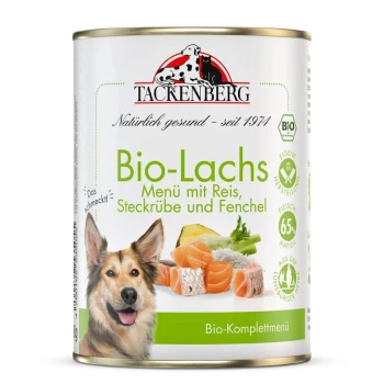 Tackenberg Bio-Lachs Hundefutterdose mit Reis, Steckrübe und Fenchel, mit fröhlichem Hund und Futterabbildungen.