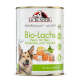Boîte de nourriture biologique pour chien Tackenberg au saumon avec riz, rutabaga et fenouil, avec image d’un chien heureux et de la nourriture.