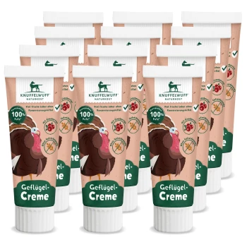 Röhren mit der Aufschrift "Knuffelwuff Naturkost Geflügel-Creme" mit einer Truthahn-Illustration, die 100% Truthahn, keine Konservierungsstoffe und Cranberries zeigt.