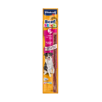 Vitakraft Beef Stick dla psów, z uśmiechniętym psem na opakowaniu, z tekstem podkreślającym '85% mięsa', 'przepis bez cukru' i 'dodatkowe witaminy.'
