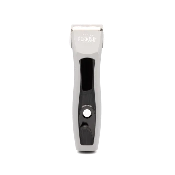 Gray and black pet grooming clipper with 'Furrish' logo, power button and metal blade on white background.