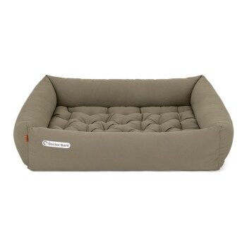 Ein plüschiges, rechteckiges Hundebett in einem sanften Taupe-Ton, mit einem gepolsterten Design und dem Logo "Doctor Bark" an der Seite.