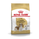 Sac de nourriture pour chiens Royal Canin Adult Cavalier King Charles avec un Cavalier King Charles Spaniel sur le devant, avec un design doré et blanc.