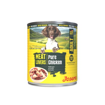Josera Adult Hundefutterdose mit Hundefoto; gelbes Etikett mit der Aufschrift 'MEAT LOVERS | Pure Chicken', 'Grain Free', 'German Quality'.