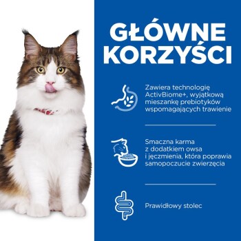 Zabawny puszysty kot z wystawionym językiem obok tekstu o korzyściach z karmy dla kotów: ActivBiome+, prebiotyki i owies dla lepszego zdrowia.
