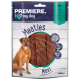 Verpackung der Premiere I love my dog Meaties Hundeleckerlis, die drei Stücke Fleisch zeigt, mit einem Etikett, das 90,5 % Fleisch und 250 g angibt.